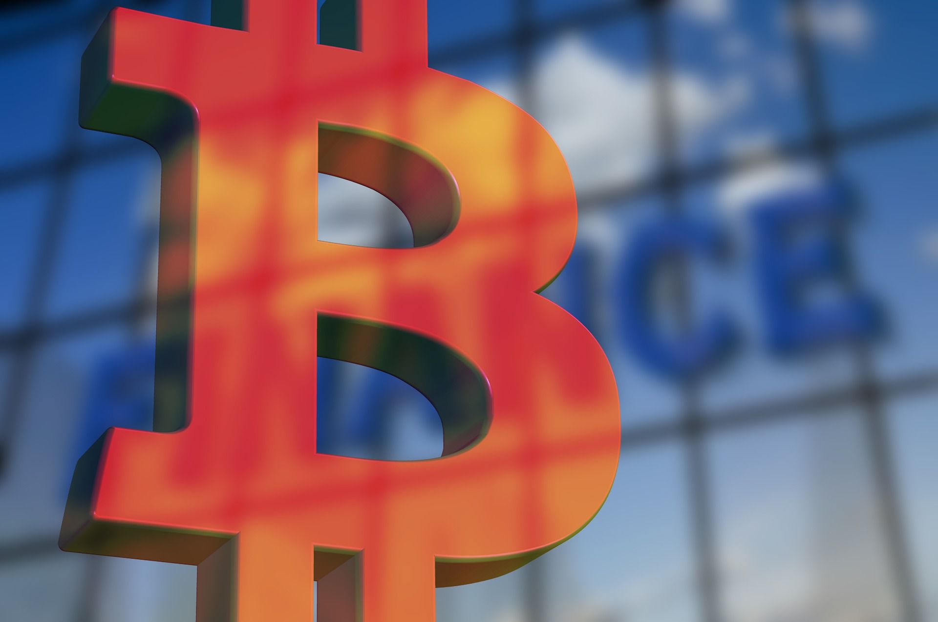 巨型橙色比特幣符號招牌，代表香港比特幣現貨 ETF 背後持有的真實比特幣